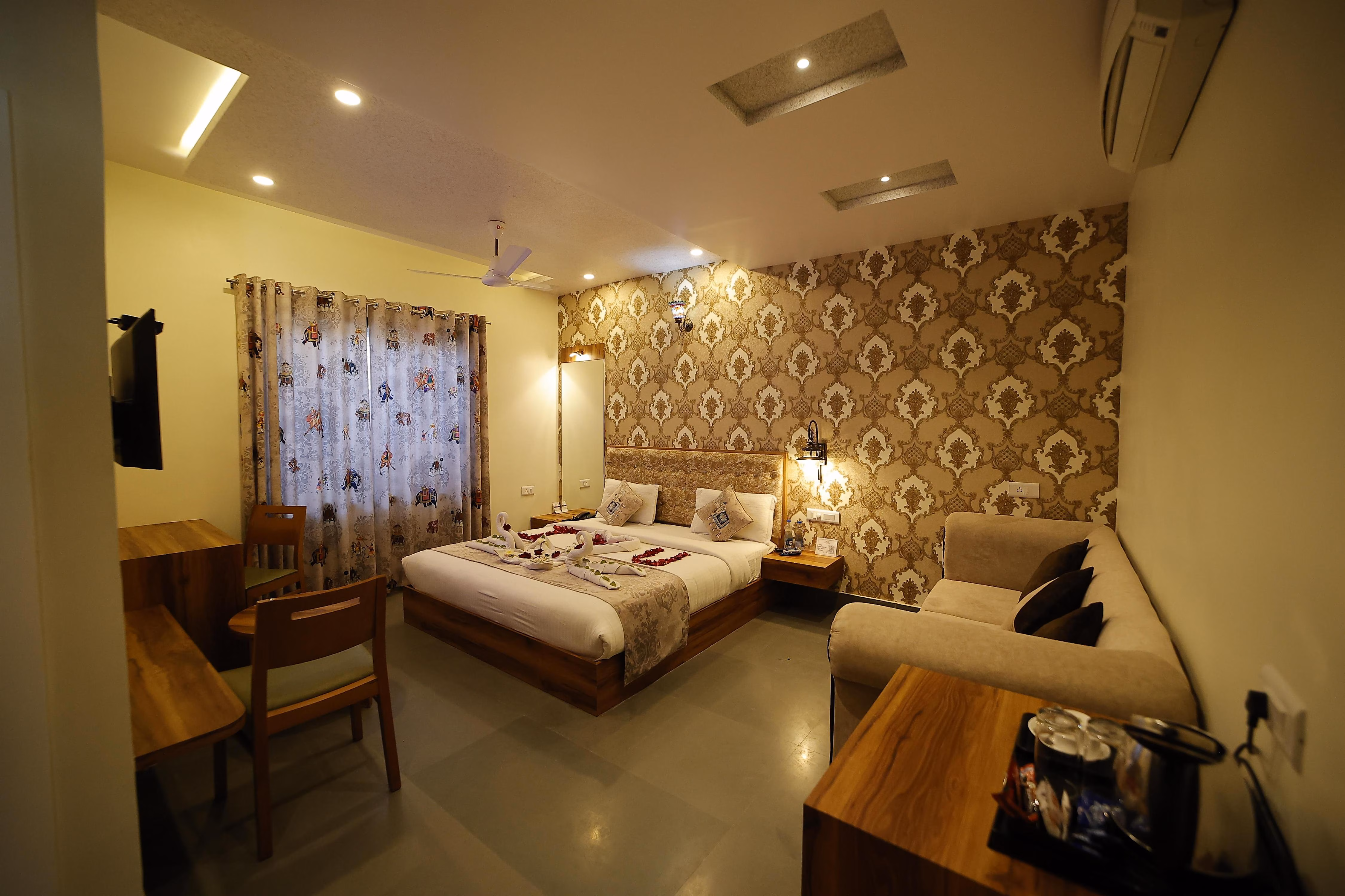 A person kayaking on a mountain lake.